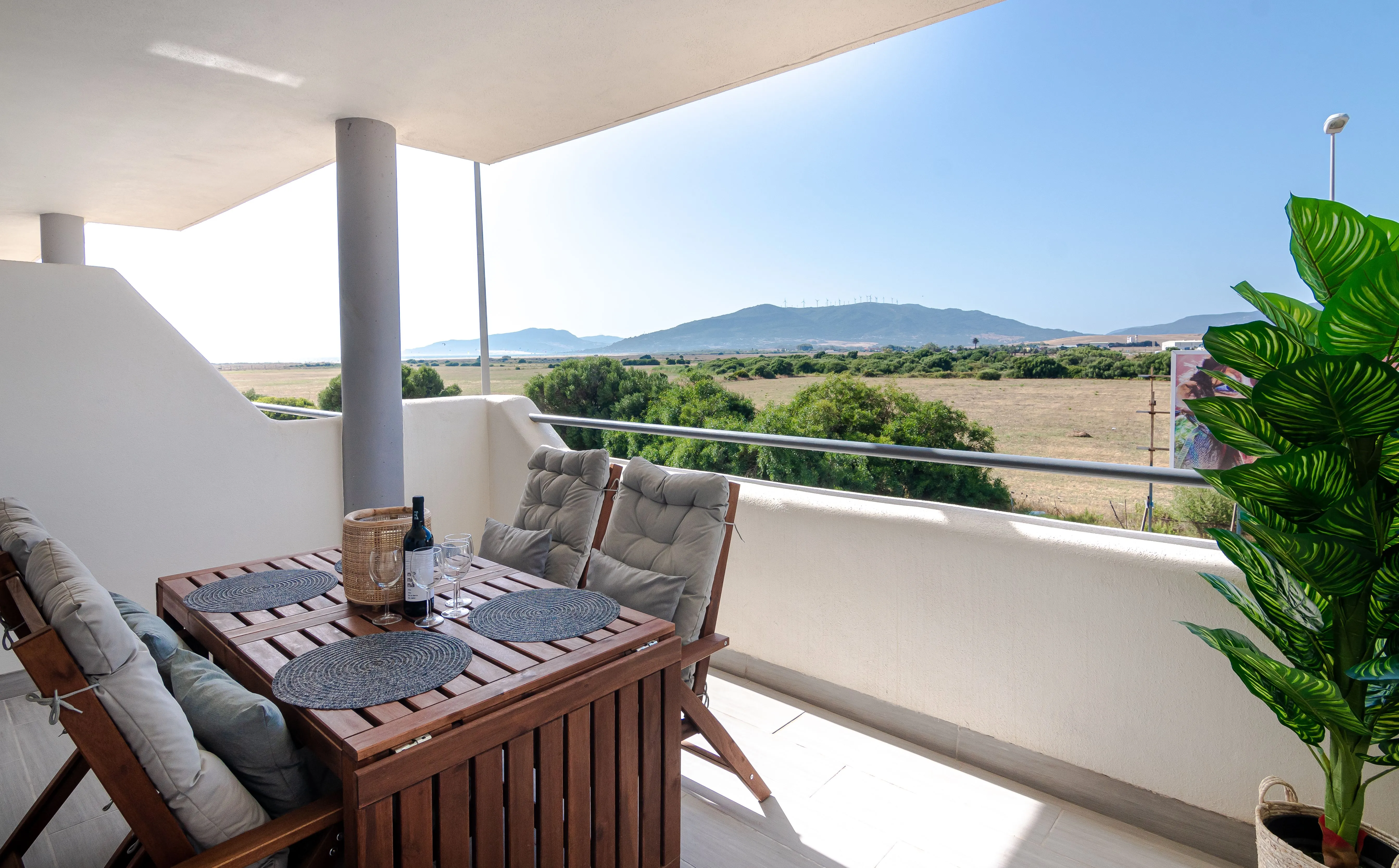 Balcony view towards the beach and hills